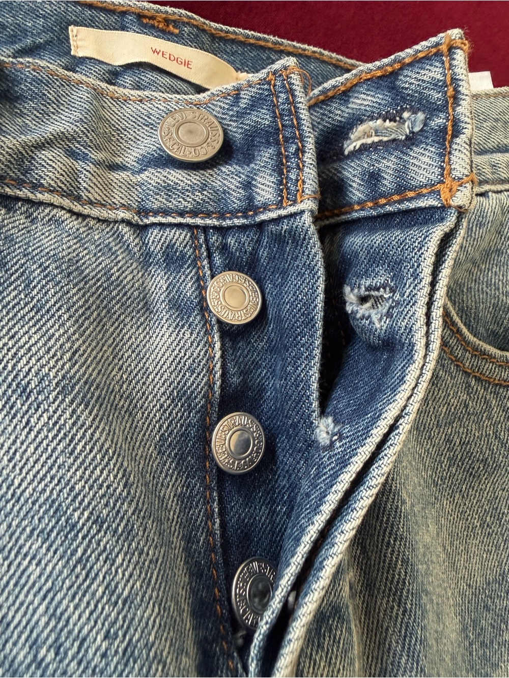 Levi's Wedgie High-Rise Light Blue Denim Jeans with Metal Buttons